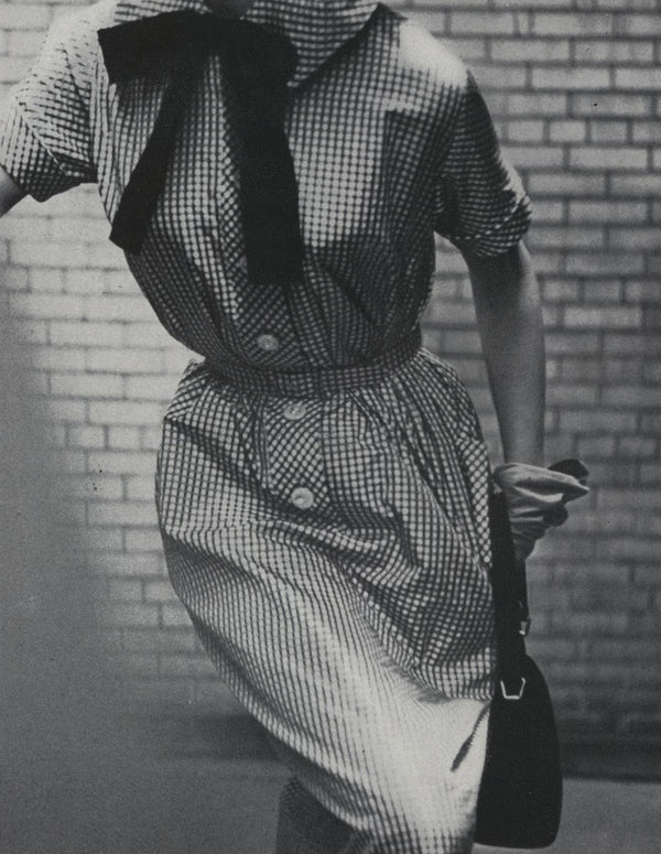 Vogue, November 1950. Photographer: Frances Mclaughlin.